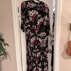 Long flowered maxi dress from Torrid. 3/4 sleeve. buttons down the whole front.